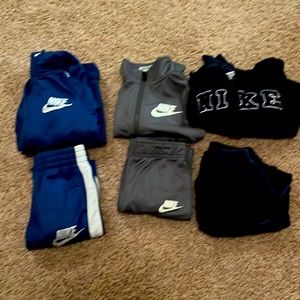 3 Nike tracksuits